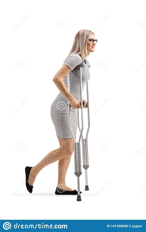 Young Woman Walking With Crutches Stock Photo Image Of Bend Pain