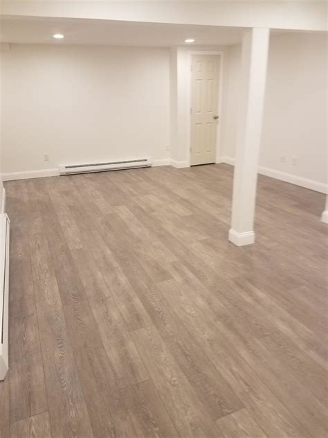 Coretec Wide Plank Vinyl Flooring Over A Concrete Slab In Basement