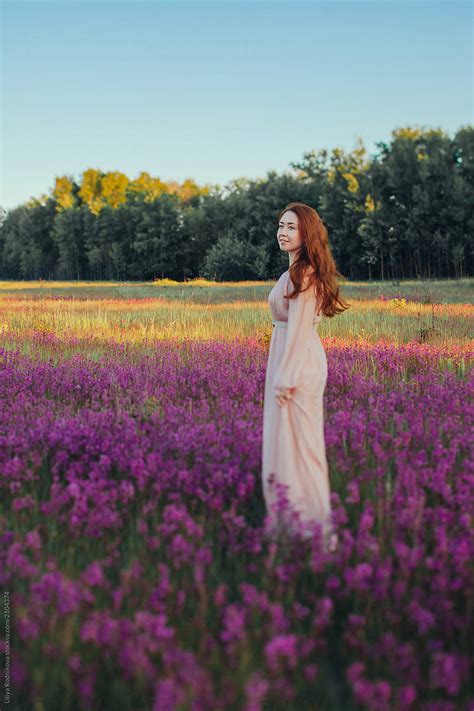 Pretty Redhead Girl Wearing Long Beautiful Gown Standing At Summer