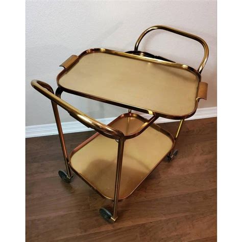 Mirrored top and shelf, gold finish; Mid-Century Modern Tray Top Rolling Bar Cart by Kaymet ...