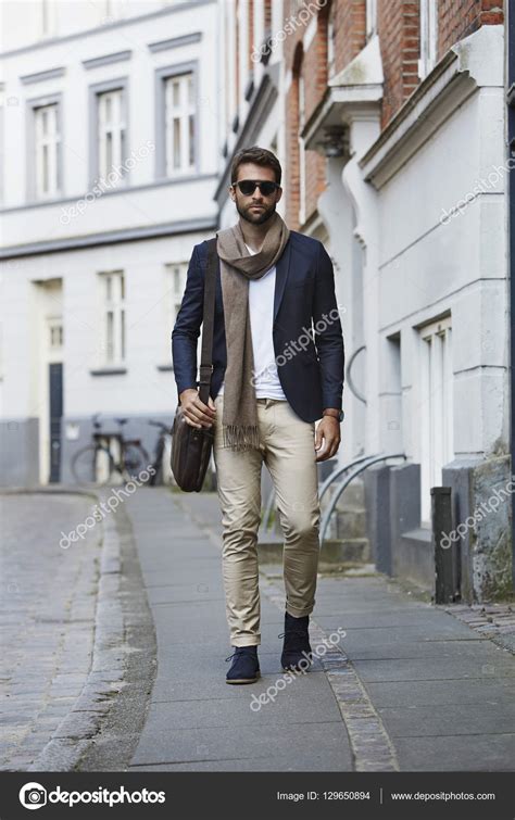 Handsome Man Walking In City Stock Photo By ©sanneberg 129650894