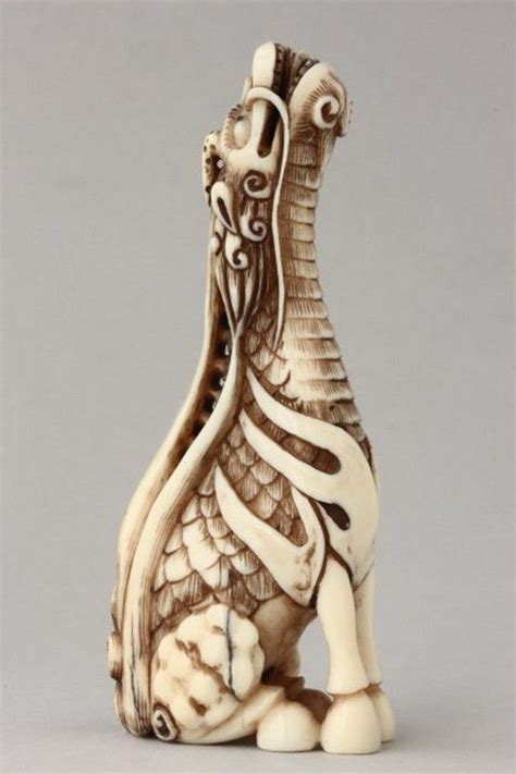 mythical ivory netsuke with raised head and scaled body netsuke oriental