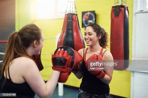Two Boxing Gloves Photos And Premium High Res Pictures Getty Images