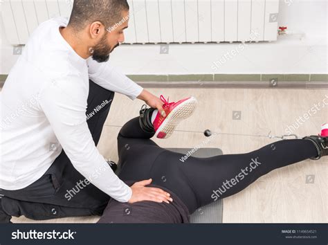 Trainer Instructing Woman Proper Workout Gym Stock Photo 1149654521
