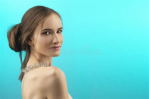 A Beautiful Girl With Naked Shoulders And Nude Makeup Wearing A Stock Photo Image Of Face