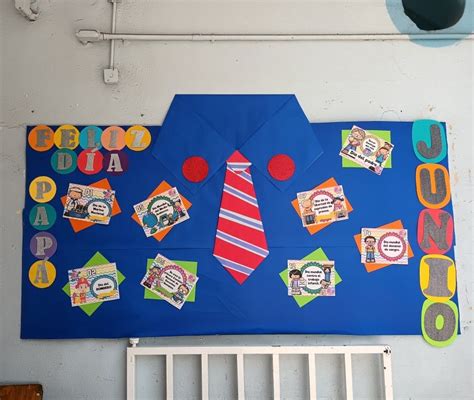 A Bulletin Board Is Decorated With Colorful Papers And Magnets On The Blue Wall Above It