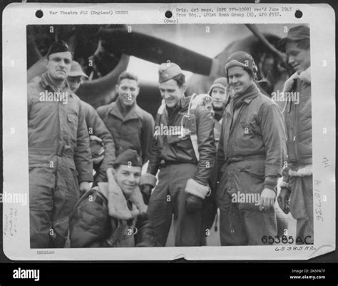 Crew 7 Of The 613th Bomb Squadron 401st Bomb Group Beside A Boeing B