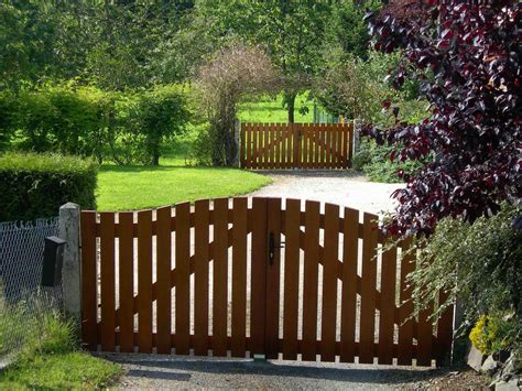Simple Wooden Gates In A Beautiful Normandy Garden Wooden Garden