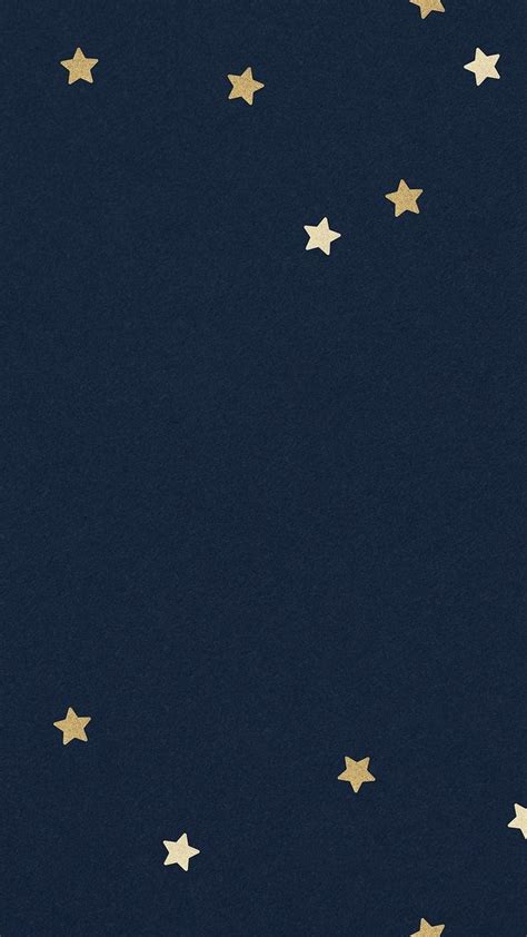 Gold Stars Against A Dark Blue Background