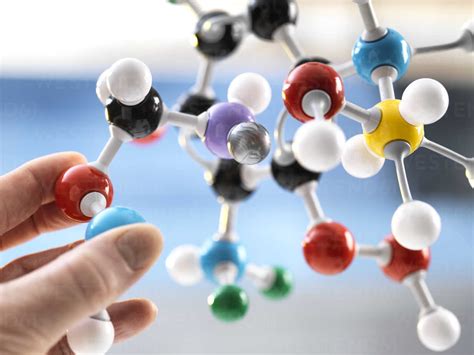Scientist Holding A Molecular Model Stock Photo
