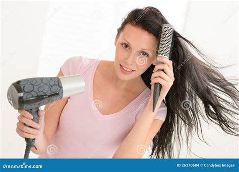 Woman Blow Drying Hair Using Round Hairbrush Stock Photo Image Of