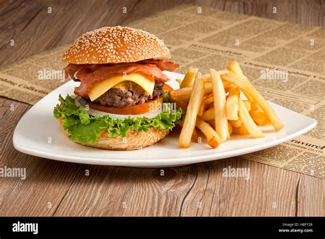 Burger With French Fries On White Plate Stock Photo Alamy