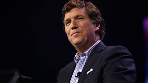 tucker carlson network parks billboard trucks at major news outlets proclaiming corporate media