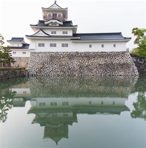 Toyama Castle With Reflection In Water Castle Historic Landmark Stock