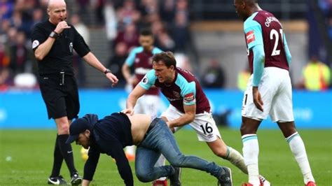 West Ham Fans Invade Home Pitch Heckle Ownership Protest During Premier League Match Article