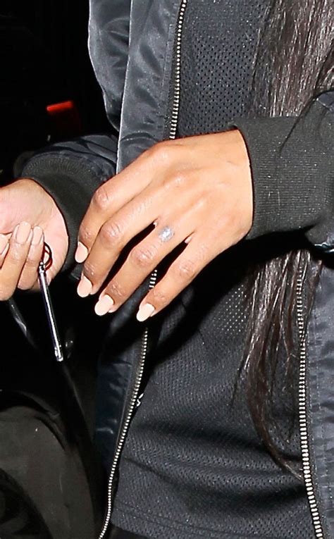 ciara and future have split up and she s removing his initial tattoo from her ring finger—see