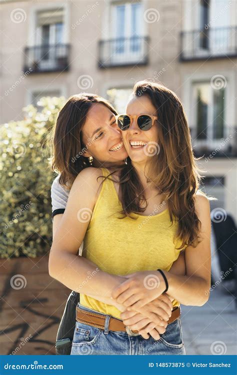 Young Women Lesbian Women Couple Hugging Stock Image Image Of Outside
