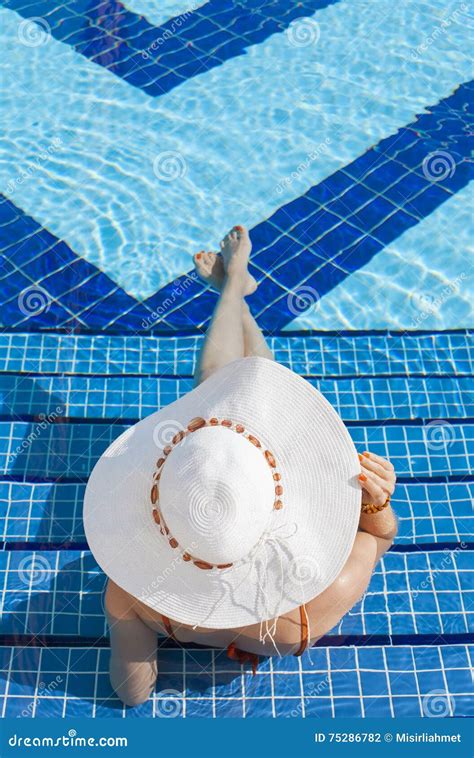 Woman Relaxing In A Resort Swimming Pool Stock Photo Image Of Blue