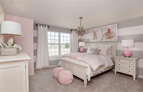 Striped Gray Walls And Pink Decor Are The Perfect Match In This