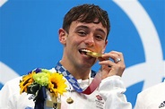 Diver Tom Daley wins gold, says he's proud to be a gay champion