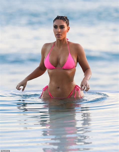 Kim Kardashian Shows Off Her Famous Curves In Hot Pink Bikini Daily