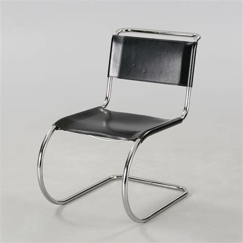 Barcelona chair of ludwig mies van der rohe. A "MR-10" chair, designed by Ludwig Mies van der Rohe for ...