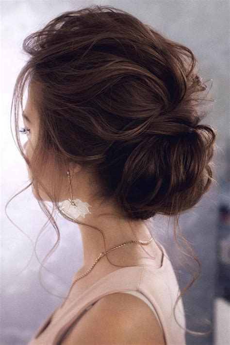 20 trendy low bun wedding updos and hairstyles 2024