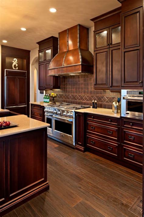 Enjoy free shipping on most stuff, even big stuff. Dark rich wood and copper | Traditional kitchen design ...