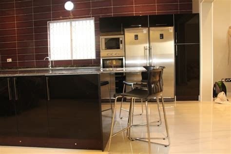 Solid wood is the most popular kitchen cabinet design choice. MPB, Lekki, Lagos, Nigeria - Modern - Kitchen - Other - by ...