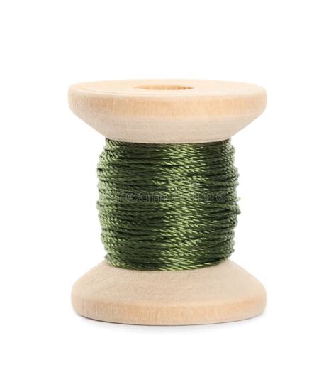 Wooden Spool Of Olive Green Sewing Thread Isolated On White Stock Photo