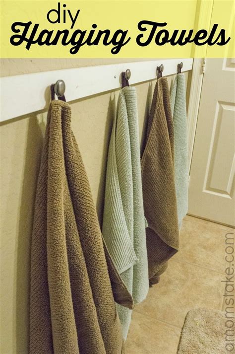 While there are many towel racks that attach to your wall, if kes stainless steel bath towel rack bathroom shelf with double towel bar 60 cm storage. DIY Hanging bathroom towels tutorial - Super easy way to ...
