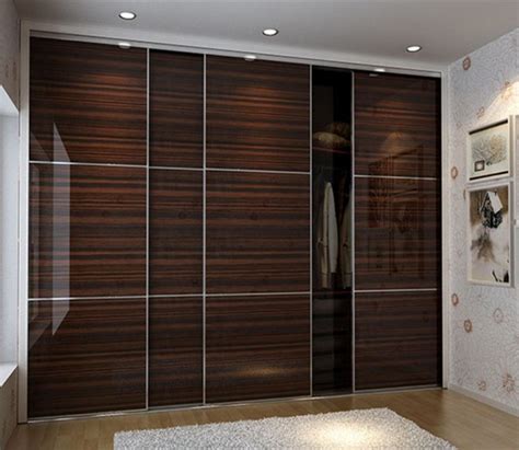 Black bedroom furniture adds a touch of class. laminate wardrobe designs in black bedroom furniture