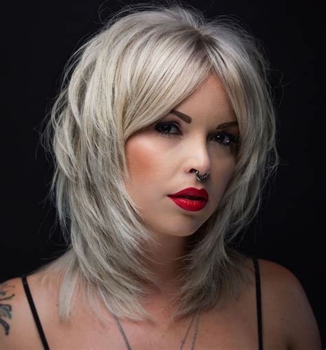 Edgy Platinum Feathered Shag Medium Length Hair Cuts Medium Hair