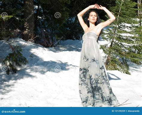 Beautiful Woman With Airy Dress Posing In The Snow Stock Image Image Of Model Green