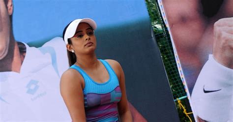 Priyamani Playing Tennis In Mini Skirt Bends Down To Show Off Her Cleavages Desi Images