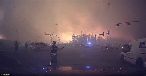 Alberta Dash Cam Footage Captures A Man Drive Through Flames As