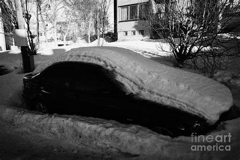 Bmw Car Buried In Snow By The Side Of A Road In Kirkenes Finnmark