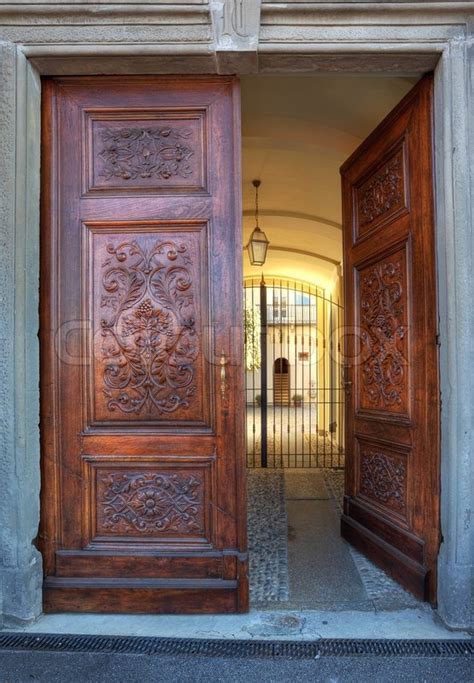 Vertical Oriented Image Of Beautiful Ornate Wooden Door At