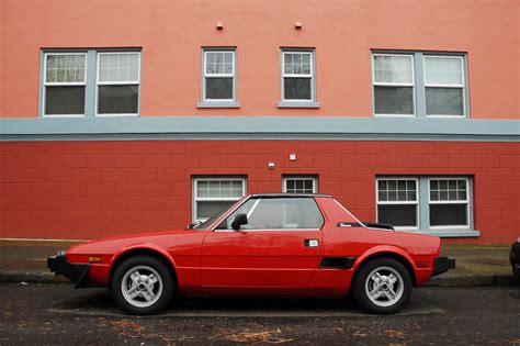 The 2020 fiat 124 spider ranks near the bottom of the sports car class. OLD PARKED CARS.: 1980 Fiat X1/9.