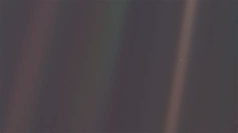 The Pale Blue Dot The Photograph Of Planet Earth Taken On February