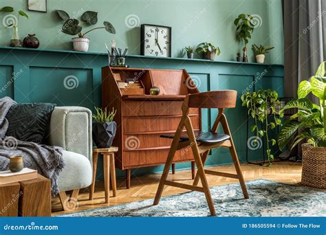Stylish Interior Design Retro Wooden Cabinet Chair Mint Sofa Lot Plants Vintage Clock Decoratnion Elegant Personal 186505594 
