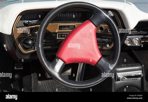 Red Steering Wheel On An Old Classy Car Stock Photo Alamy