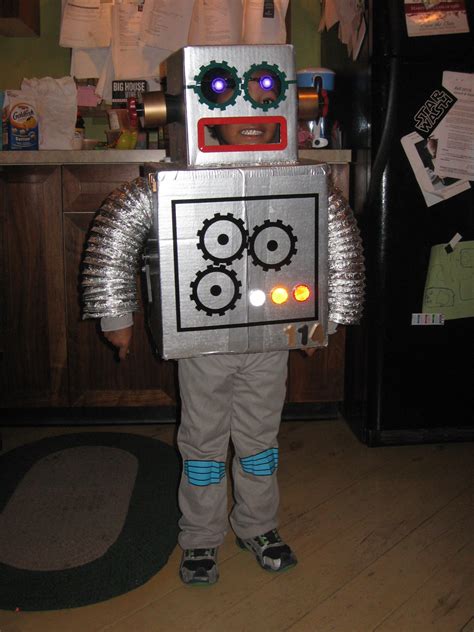 Homemade Robot Costume Made From Cardboard Boxes And Stickers And