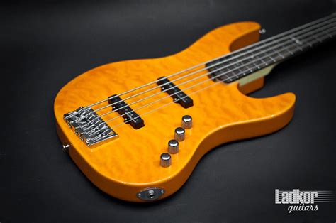 Продам esp ltd elite j5 quilted see thru amber orange jazz bass v string japan commerce bass