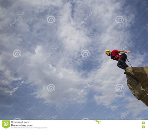 Jump Off A Cliff Stock Photo Image Of Male Bungee 76298410