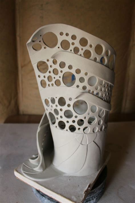 Quilting with clay | hand building slab hanging art project. slab altered vase forms | Slab ceramics, Slab pottery ...
