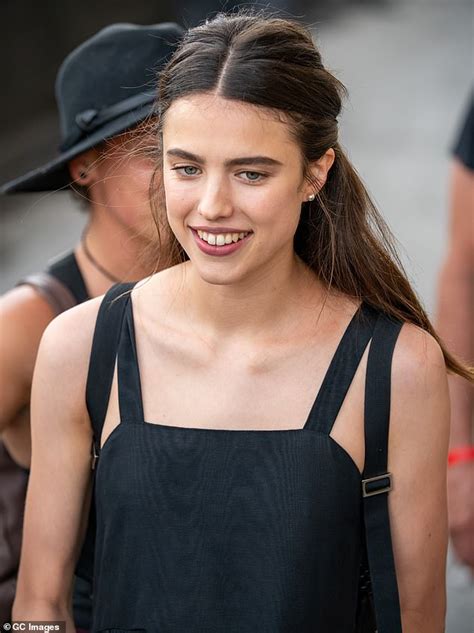 Margaret Qualley Keeps It Simple In Long Solid Black Dress While