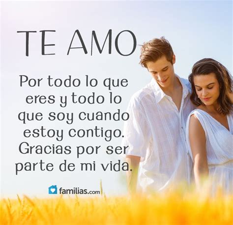 A Man And Woman Standing In A Field With The Words Te Amo On It