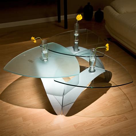 5 out of 5 stars. 3 Way Motion Triangular Glass Coffee Table at Hayneedle