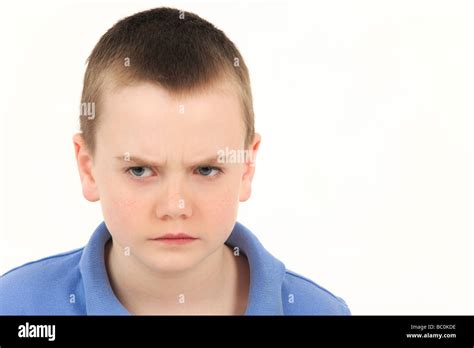 Portrait Of Unhappy Young Boy Studio Shot Stock Photo Alamy